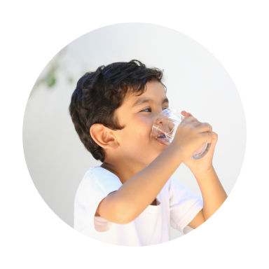 Child drinking from glass