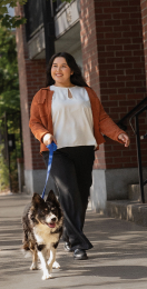 Woman walking a dog