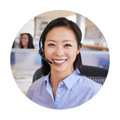 Image of woman smiling and talking on a headset