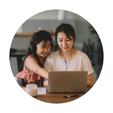 Woman and child looking at laptop screen