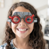 Image: Smiling child wearing glasses
