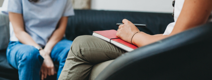 legs of people in a counseling session