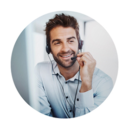 Man with a beard and mustache talking over a headset