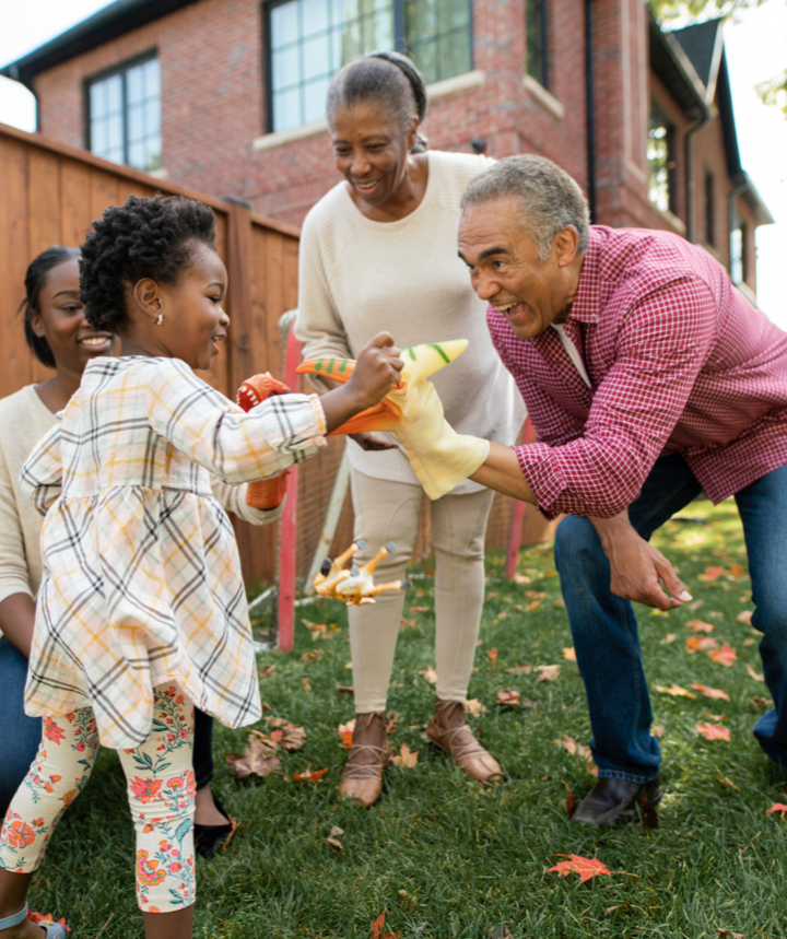 Grandparents playing with grandchildren