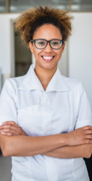 Image: Smiling vision provider wearing glasses