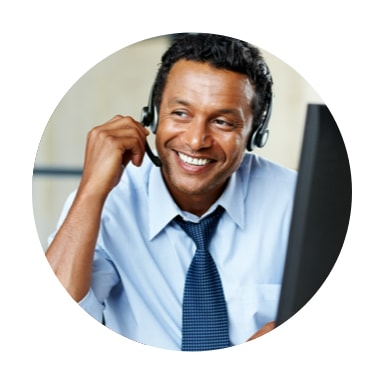 Image of man with headset on smiling