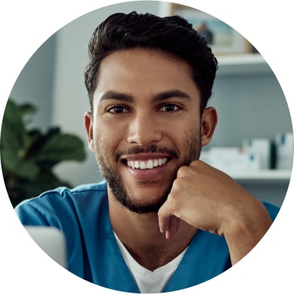 Image smiling medical professional in scrubs