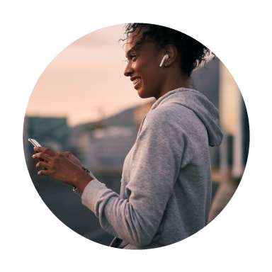 Image of woman smiling and talking on phone