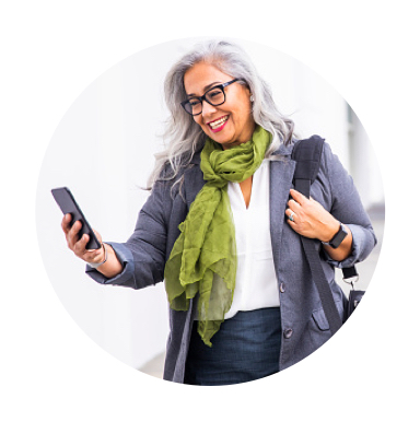 Woman smiling at cell phone