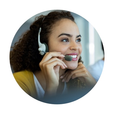 Image of woman with headset smiling